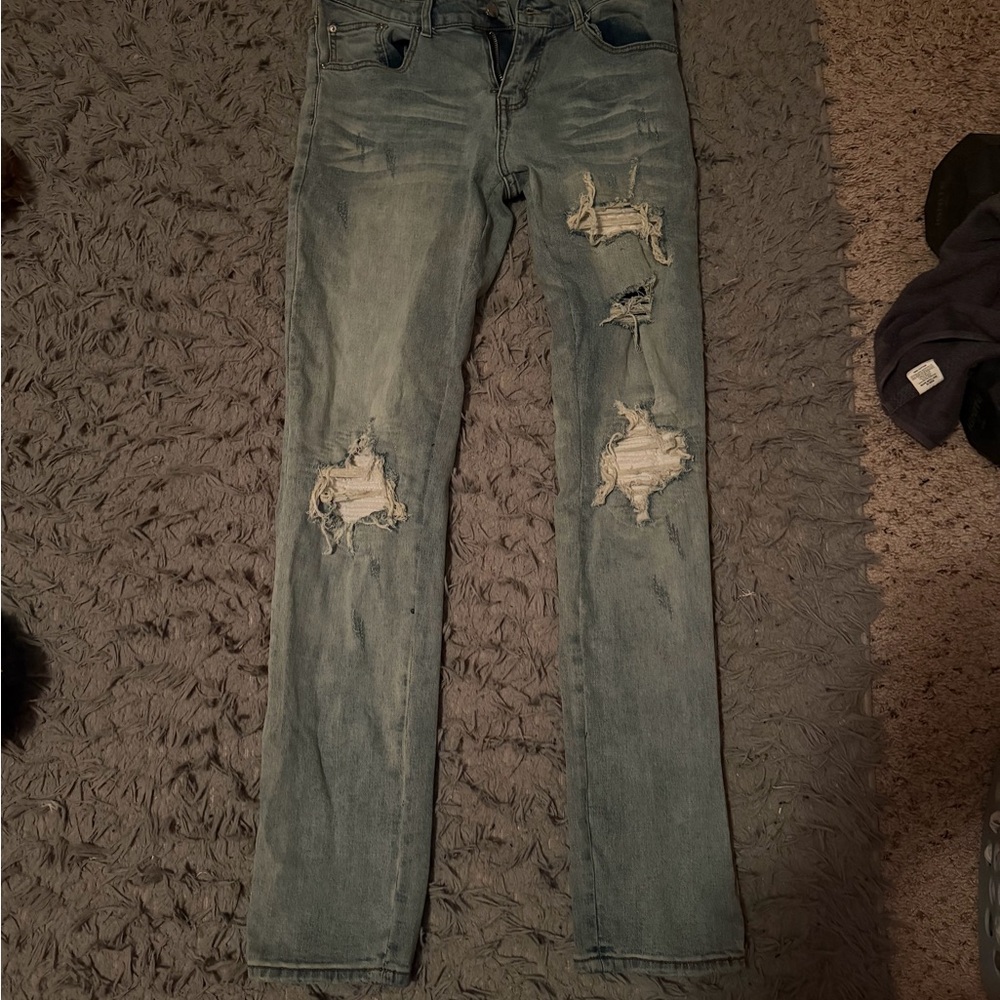 AMIRI Light Blue Distressed Skinny Jeans